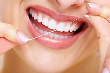 flossing after dental work